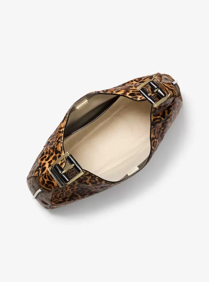 Duża torba typu hobo na ramię Nolita z nadrukiem w panterkę i sierścią cielęcą