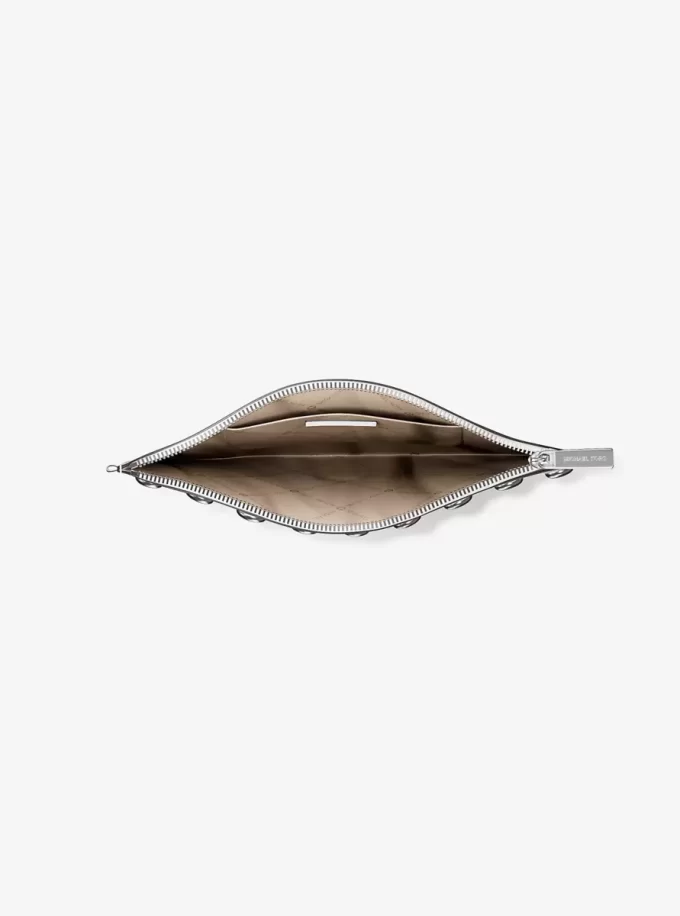 Duża torebka na nadgarstek Jet Set z ćwiekami ze skóry groszkowanej Duża torebka na nadgarstek Jet Set z ćwiekami ze skóry groszkowanej