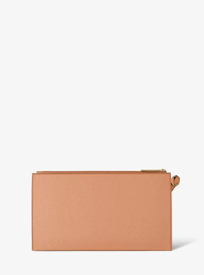 Duża torebka na nadgarstek Jet Set z ćwiekami ze skóry groszkowanej