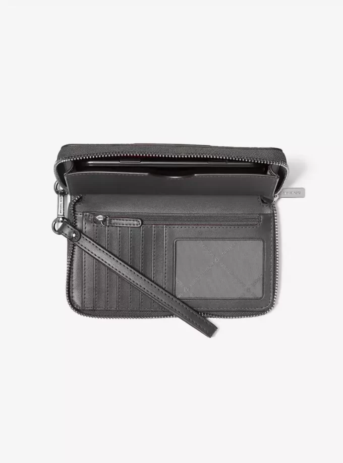 Duży metaliczny portfel na smartfon Jet Set z logo w paski