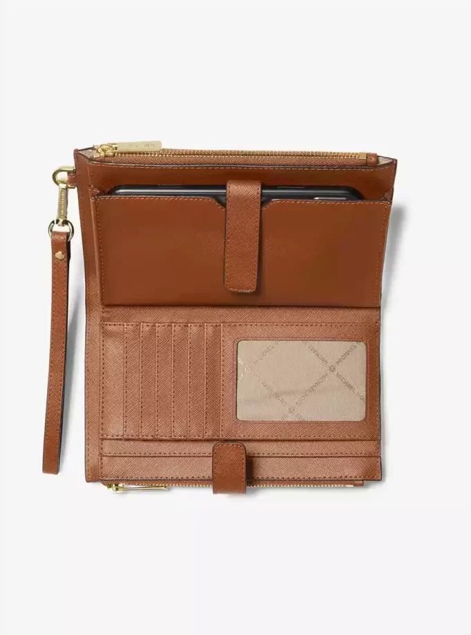 Duży skórzany portfel na nadgarstek Jet Set ze smartfonem Duży skórzany portfel na nadgarstek Jet Set ze smartfonem