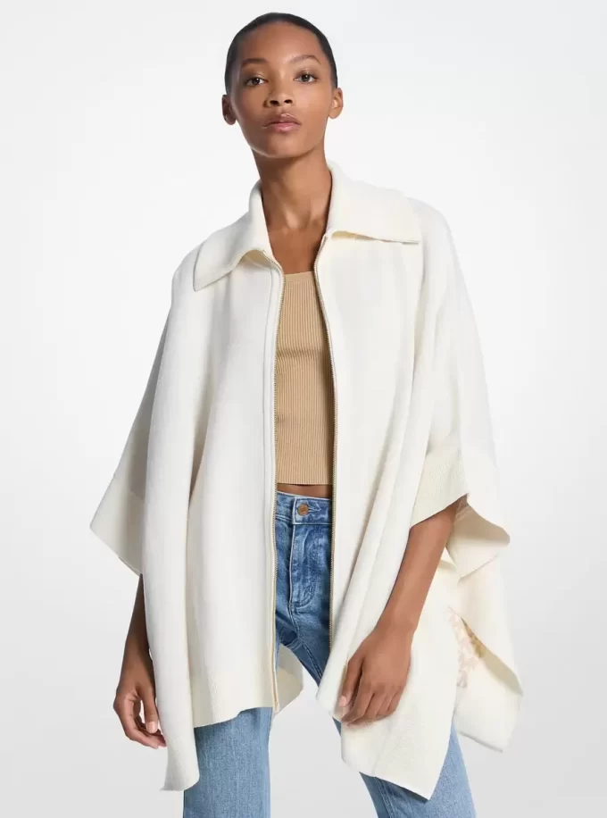 Dwustronny, zapinany na zamek ponczo z mieszanki bawełny z logo