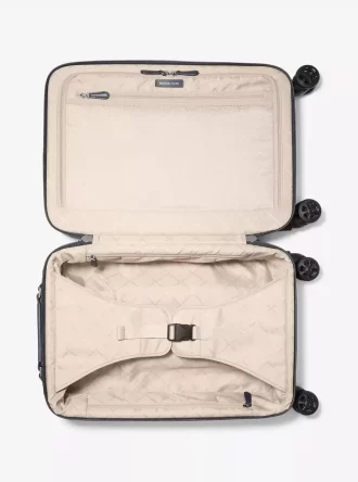 Mała walizka z logo w kropki