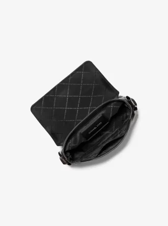 Mała, zniszczona torba na ramię Cyrus