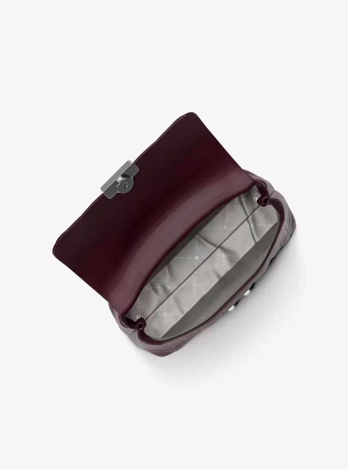 Średniej wielkości pikowana skórzana torba Tribeca