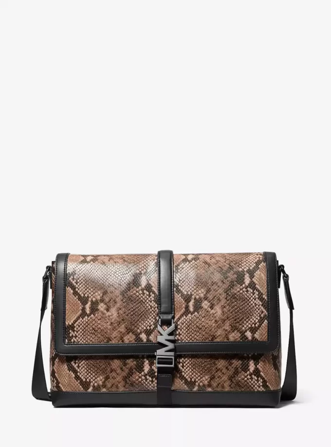 Średniej wielkości torba kurierska Cyrus z wytłoczonym wzorem węża