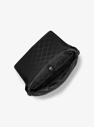 Średniej wielkości torba listonoszka Cyrus ze skóry groszkowanej