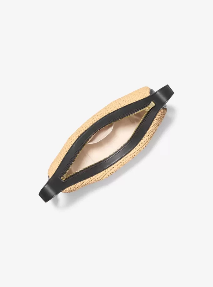 Średniej wielkości torebka Avra  wykonana ręcznie na szydełku ze skóry i materiału typu crossbody