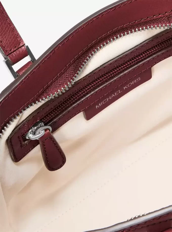 Taryn Mała skórzana torba typu crossbody z możliwością przekształcenia