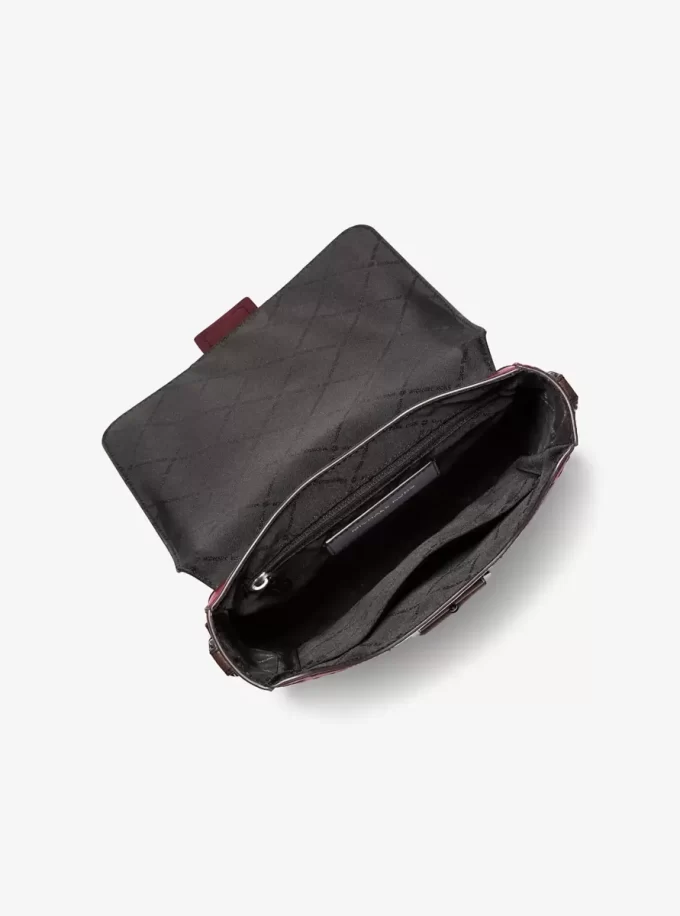 Torba listonoszka z wytłoczonym logo Colby z polerowanej skóry