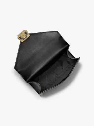 Torba na ramię Whitney z nadrukiem w panterkę i cielęcą sierścią i charakterystycznym logo