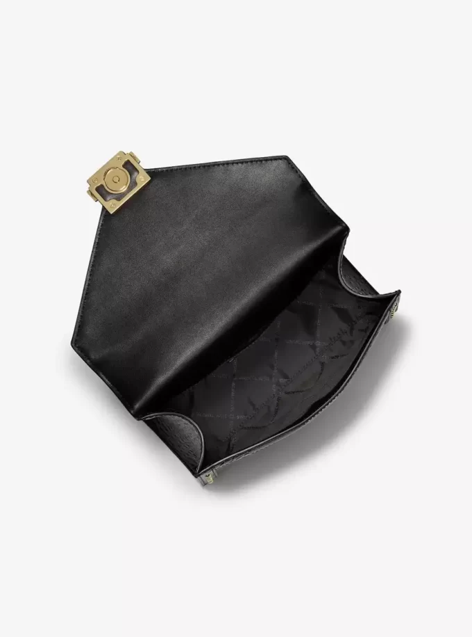 Torba na ramię Whitney z nadrukiem w panterkę i cielęcą sierścią i charakterystycznym logo