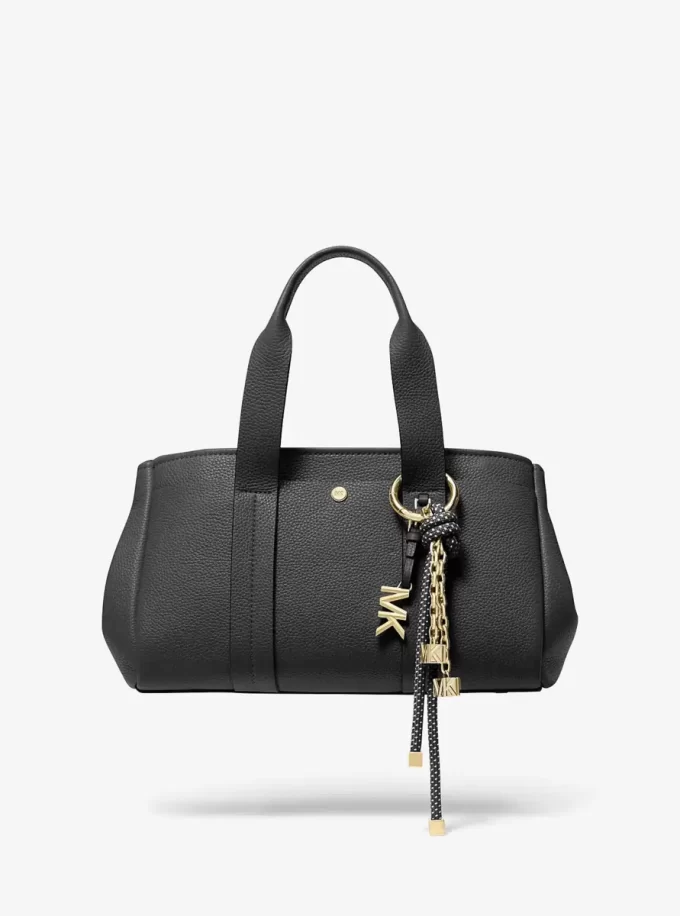 Złota zawieszka na torebkę ze sznurka w kropki